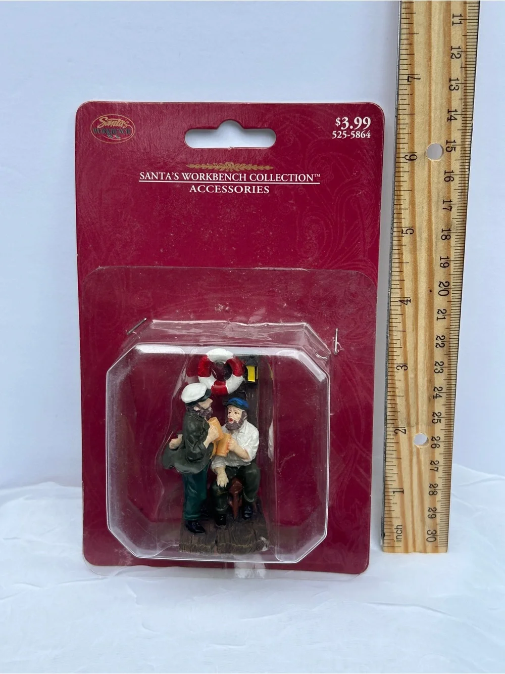Christmas village chatting sailors